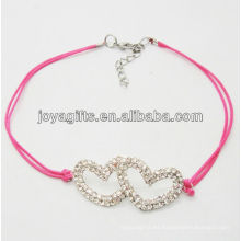 Pulsera tejida rosa